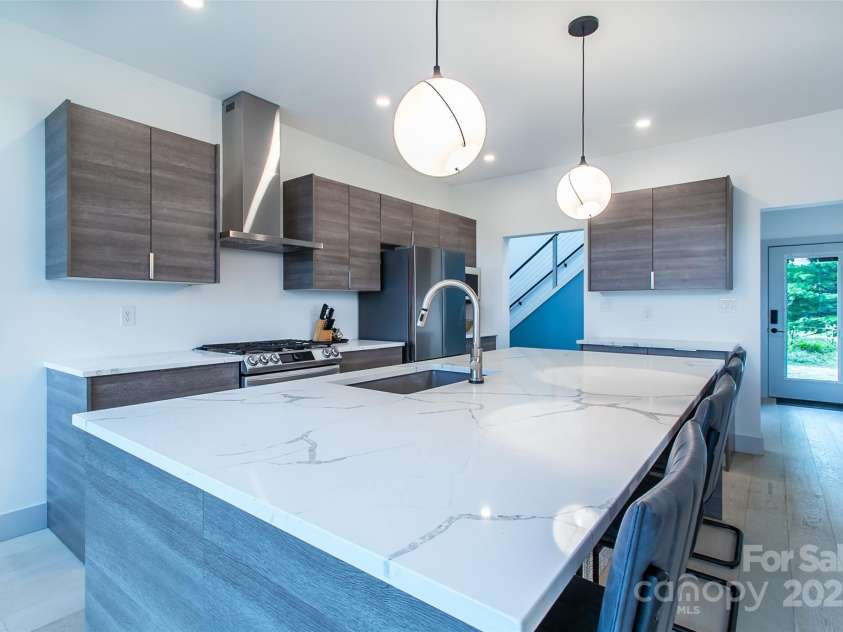 22 Lara Drive, Mills River, NC 28759.  MLS# CAR4271505, YatesRealty ID 2958. LR toward Kitchen