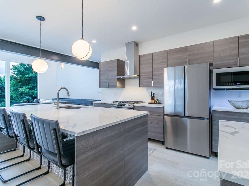 22 Lara Drive, Mills River, NC 28759.  MLS# CAR4271505, YatesRealty ID 2958. Main level rear of home toward kitchen