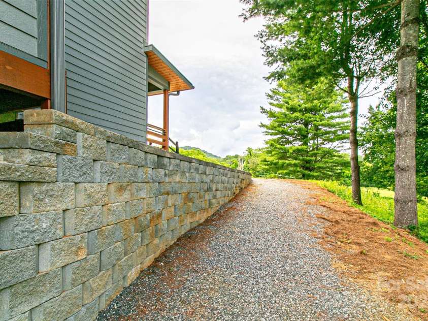 22 Lara Drive, Mills River, NC 28759.  MLS# CAR4271505, YatesRealty ID 2958. Side Right