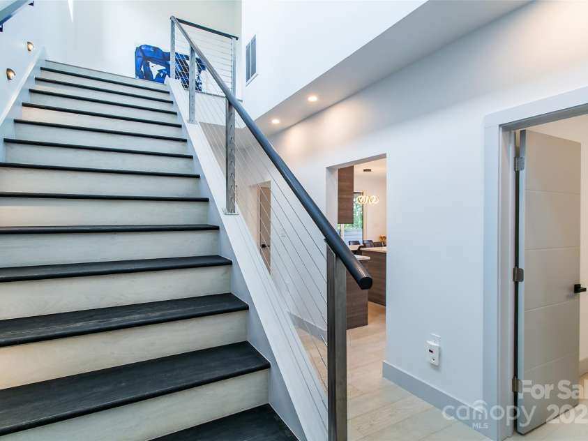 22 Lara Drive, Mills River, NC 28759.  MLS# CAR4271505, YatesRealty ID 2958. Stairs to top level