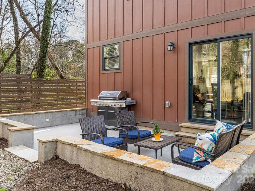 704 Azalea Avenue, Black Mountain, NC 28711.  MLS# CAR4283661, YatesRealty ID 29588. Concrete patio great for grilling and outdoor dining