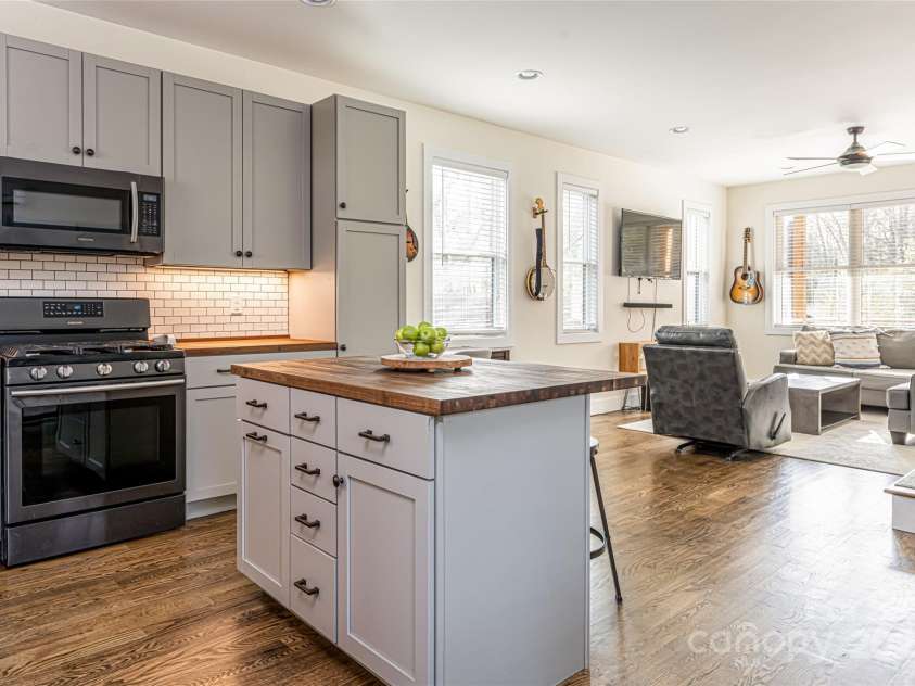 704 Azalea Avenue, Black Mountain, NC 28711.  MLS# CAR4283661, YatesRealty ID 29588. Gorgeous hardwood floor on both levels