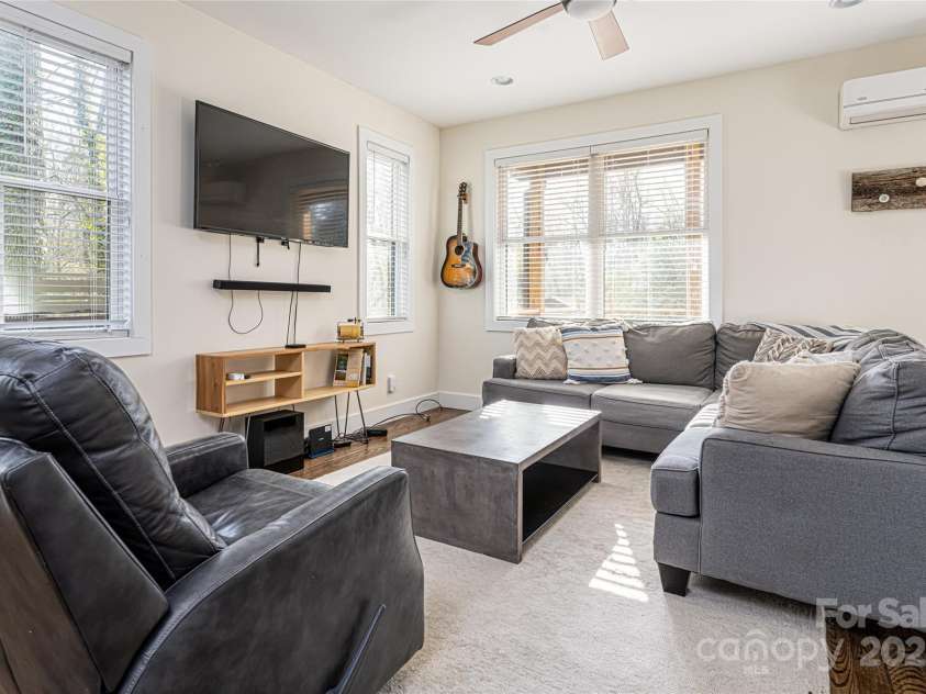 704 Azalea Avenue, Black Mountain, NC 28711.  MLS# CAR4283661, YatesRealty ID 29588. Light filled living area