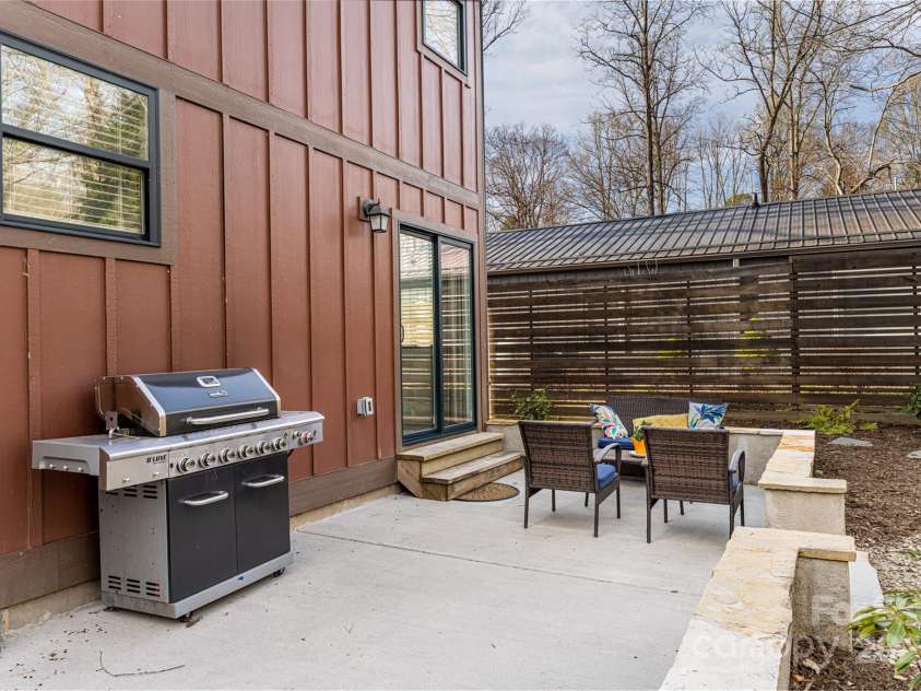 704 Azalea Avenue, Black Mountain, NC 28711.  MLS# CAR4283661, YatesRealty ID 29588. Opens off the main floor for seamless indoor/outdoor living