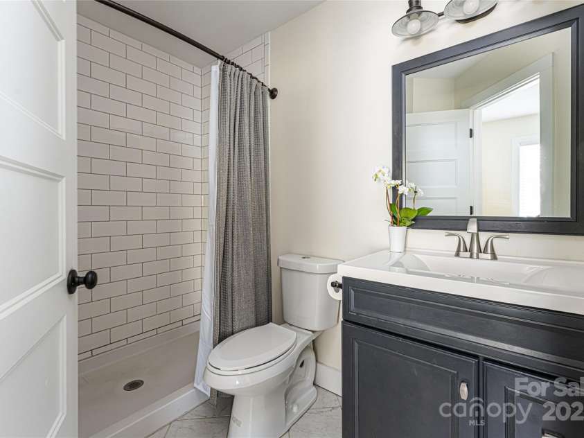 704 Azalea Avenue, Black Mountain, NC 28711.  MLS# CAR4283661, YatesRealty ID 29588. Private primary bathroom