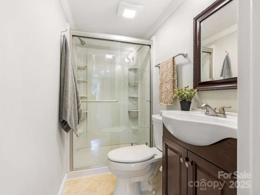 9324 Rainbow Forest Drive, Charlotte, NC 28277.  MLS# CAR4281251, YatesRealty ID 29591. Downstairs full bath