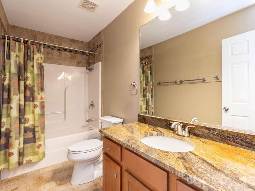 44 Deer Meadows Drive, Candler, NC 28715.  MLS# CAR4373513, YatesRealty ID 29593. Hall Bathroom