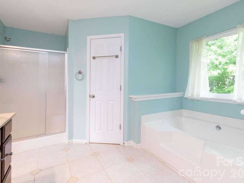 44 Deer Meadows Drive, Candler, NC 28715.  MLS# CAR4373513, YatesRealty ID 29593. Primary Bathroom
