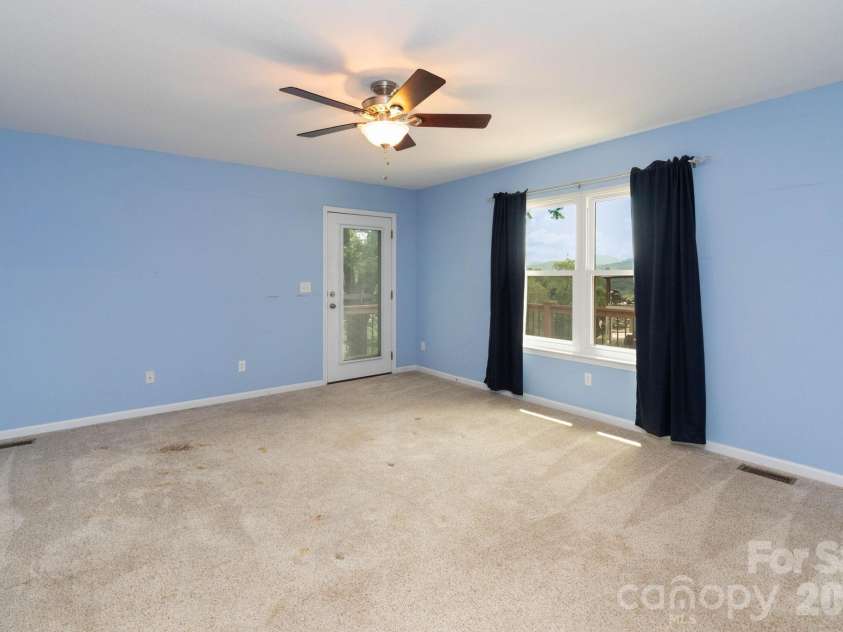 44 Deer Meadows Drive, Candler, NC 28715.  MLS# CAR4373513, YatesRealty ID 29593. Primary Bedroom
