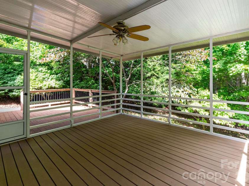 44 Deer Meadows Drive, Candler, NC 28715.  MLS# CAR4373513, YatesRealty ID 29593. Screened Porch