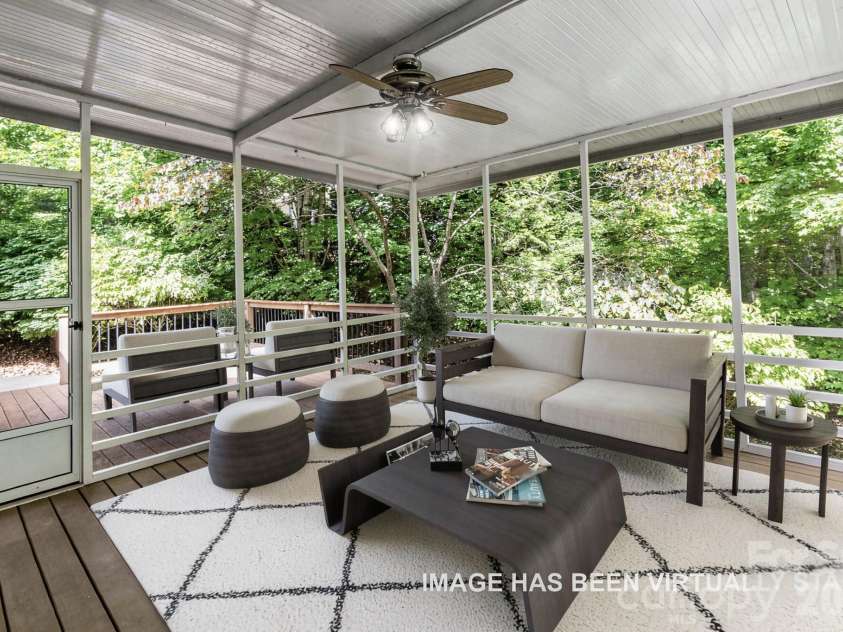 44 Deer Meadows Drive, Candler, NC 28715.  MLS# CAR4373513, YatesRealty ID 29593. Screened Porch - Virtually Staged