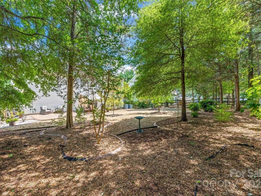 11621 Withers Mill Drive, Charlotte, NC 28278.  MLS# CAR4286202, YatesRealty ID 29594. Mature trees provide shade and privacy.