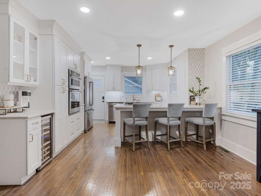 1751 Merriman Avenue, Charlotte, NC 28203.  MLS# CAR4307833, YatesRealty ID 29602. Kitchen with marble backsplash