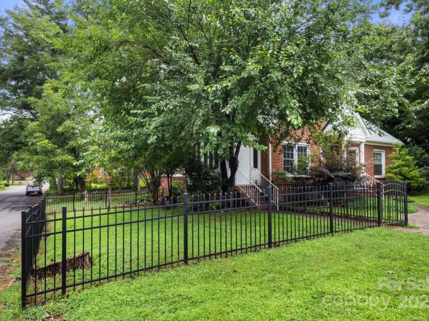 728 Blanton Street, Shelby, NC 28150.  MLS# CAR4274982, YatesRealty ID 29604. A great fence starts in the front of the house and wraps around to the side.