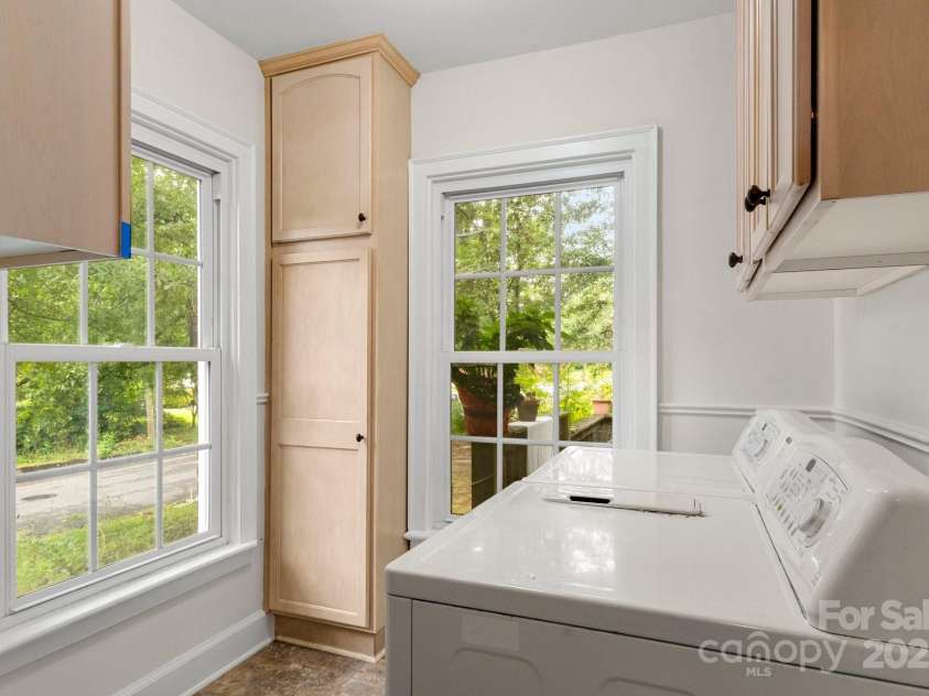 728 Blanton Street, Shelby, NC 28150.  MLS# CAR4274982, YatesRealty ID 29604. Even the laundry room has large windows for bright light. There are built in cabinets, and the washer + dryer also remain.