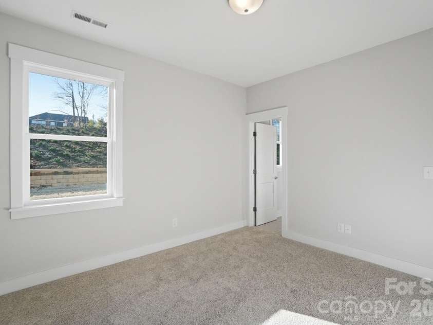 5054 McLaughlin Loop, Waxhaw, NC 28173.  MLS# CAR4329156, YatesRealty ID 29609. Guest suite on main