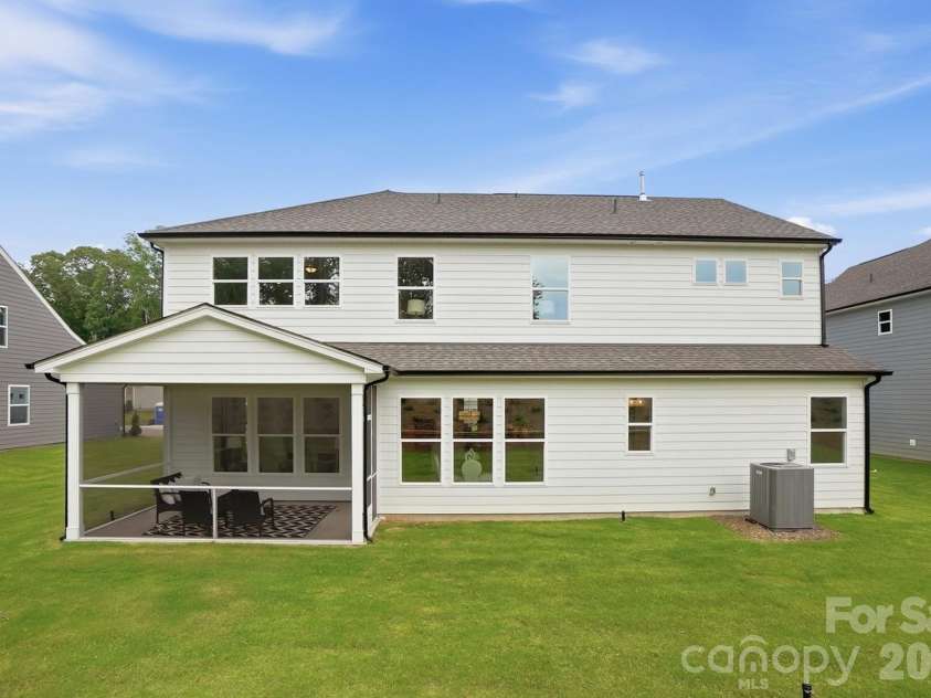 5054 McLaughlin Loop, Waxhaw, NC 28173.  MLS# CAR4329156, YatesRealty ID 29609. Rear of home
