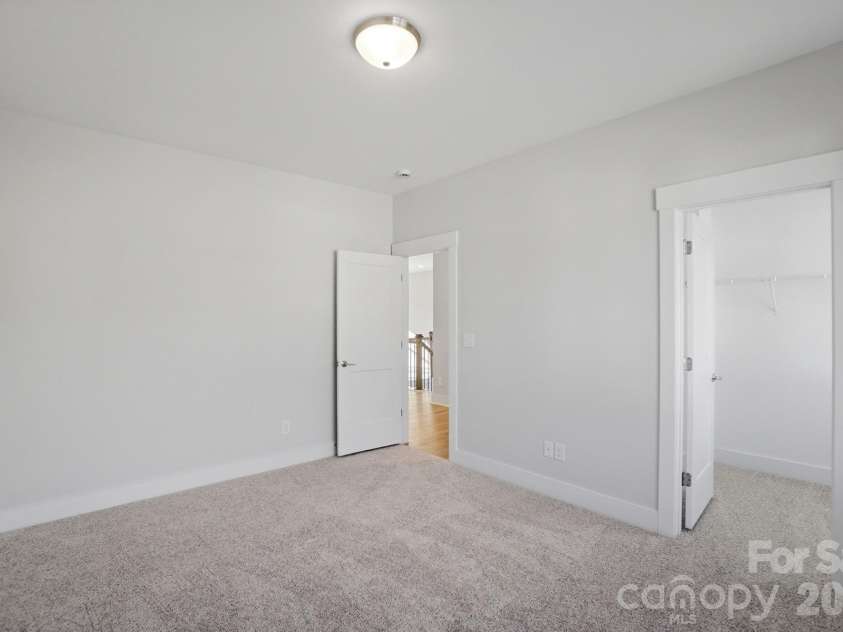 5054 McLaughlin Loop, Waxhaw, NC 28173.  MLS# CAR4329156, YatesRealty ID 29609. Secondary bedroom