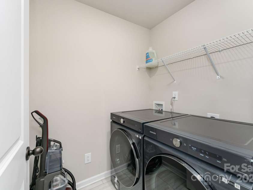 4037 Stoneygreen Lane, Charlotte, NC 28215.  MLS# CAR4283397, YatesRealty ID 29610. Laundry Room upper level