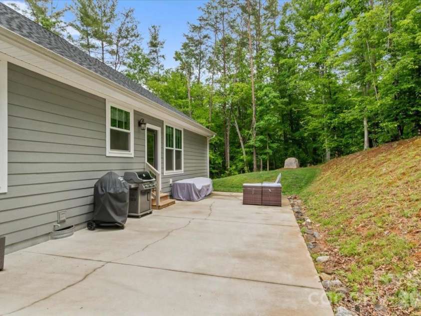 36 Cherry Ridge Lane, Weaverville, NC 28787.  MLS# CAR4385197, YatesRealty ID 29619. Back patio