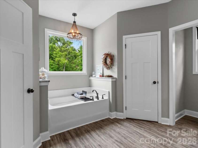 36 Cherry Ridge Lane, Weaverville, NC 28787.  MLS# CAR4385197, YatesRealty ID 29619. Primary bath offers 2 additional walk in closets