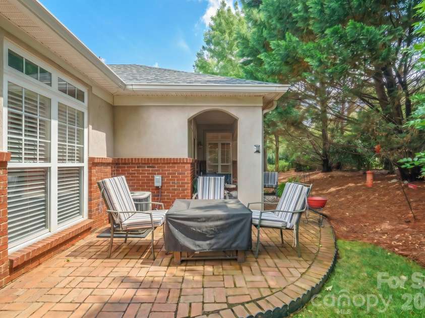 8829 Legacy Lake Lane, Charlotte, NC 28269.  MLS# CAR4385979, YatesRealty ID 29621. Back Patio