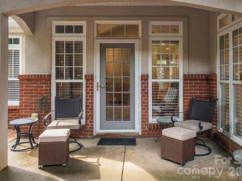 8829 Legacy Lake Lane, Charlotte, NC 28269.  MLS# CAR4385979, YatesRealty ID 29621. Back Patio