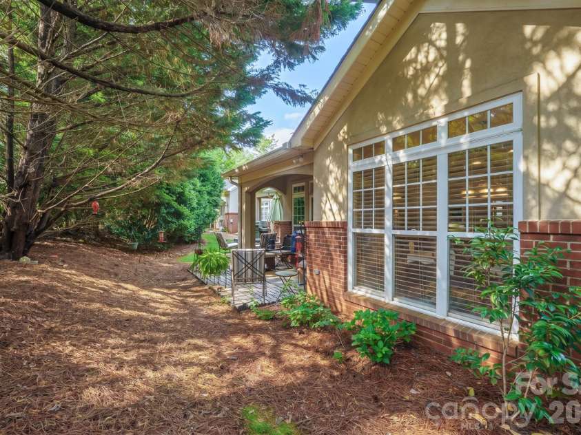8829 Legacy Lake Lane, Charlotte, NC 28269.  MLS# CAR4385979, YatesRealty ID 29621. Back yard