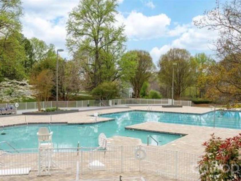 8829 Legacy Lake Lane, Charlotte, NC 28269.  MLS# CAR4385979, YatesRealty ID 29621. Pool