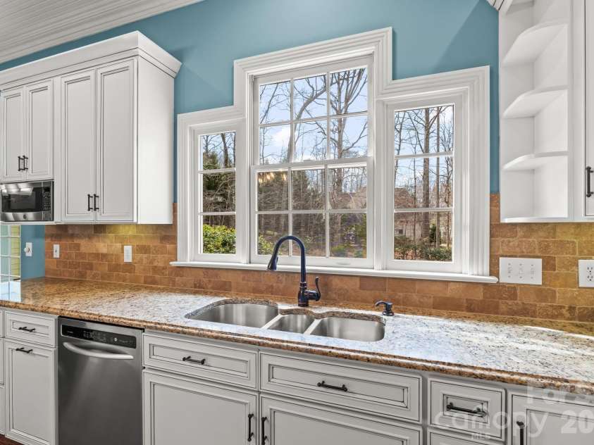 7902 Southerland Drive, Browns Summit, NC 27214.  MLS# CAR4372307, YatesRealty ID 29622. 