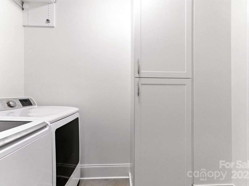 1614 Lombardy Circle, Charlotte, NC 28203.  MLS# CAR4279455, YatesRealty ID 29626. Upper level laundry room