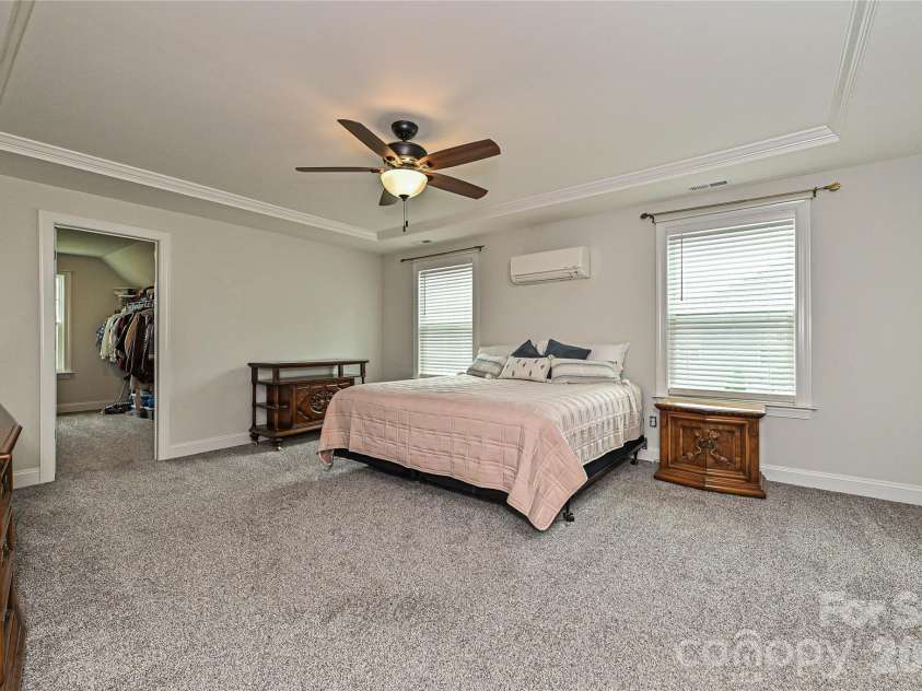 406 Sinaloa Street, Waxhaw, NC 28173.  MLS# CAR4390776, YatesRealty ID 29627. Oversized primary bedroom has two walk-in closets!
