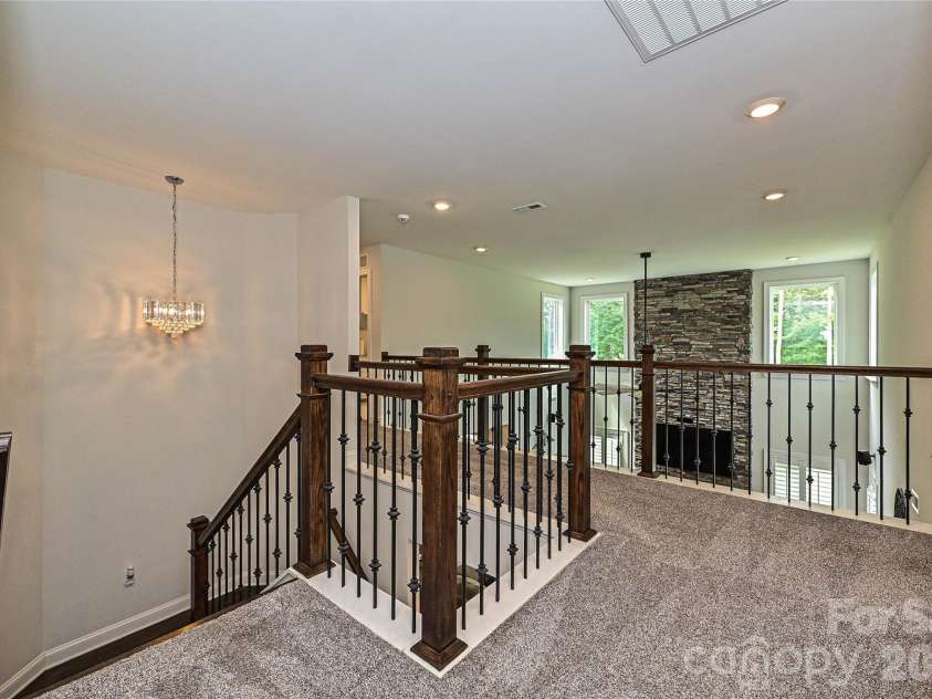 406 Sinaloa Street, Waxhaw, NC 28173.  MLS# CAR4390776, YatesRealty ID 29627. Second floor landing