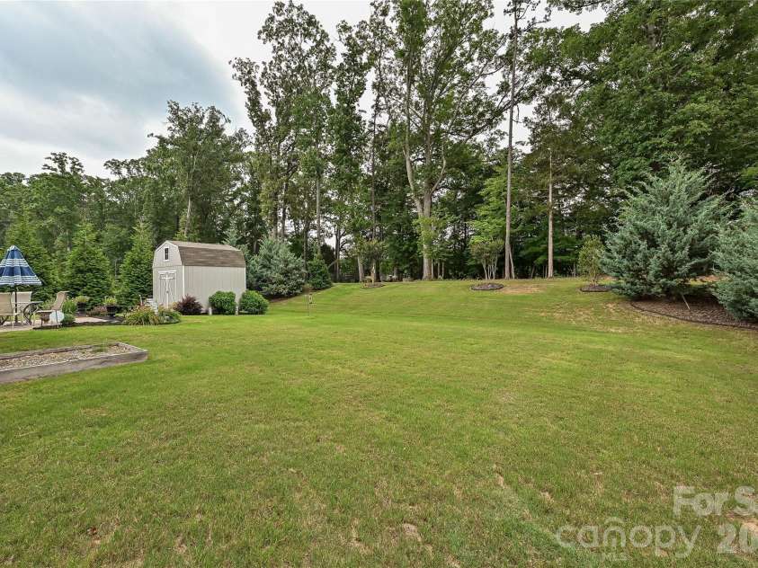 406 Sinaloa Street, Waxhaw, NC 28173.  MLS# CAR4390776, YatesRealty ID 29627. The backyard is very private