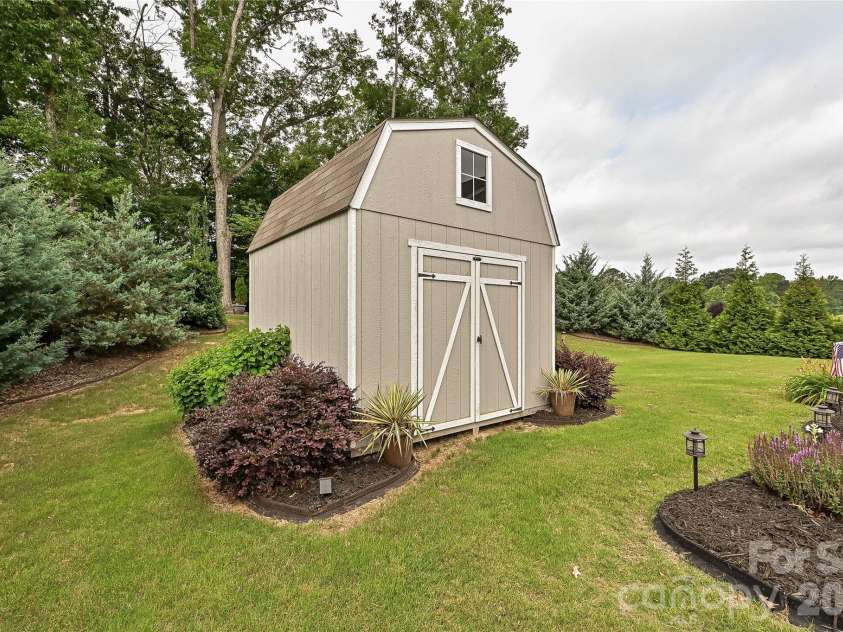 406 Sinaloa Street, Waxhaw, NC 28173.  MLS# CAR4390776, YatesRealty ID 29627. This large shed is great for extra storage