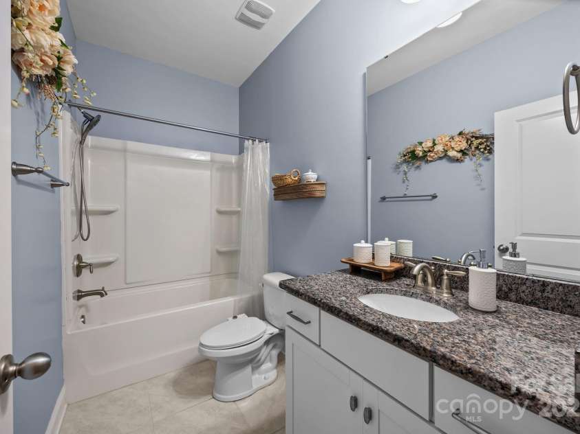 127 Atwater Landing Drive, Mooresville, NC 28117.  MLS# CAR4283079, YatesRealty ID 29629. Downstairs bathroom