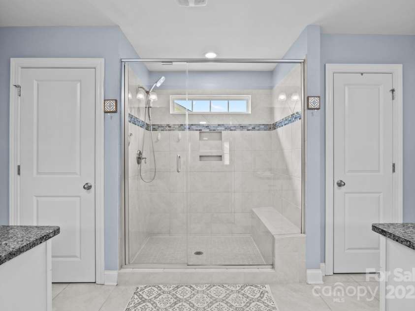 127 Atwater Landing Drive, Mooresville, NC 28117.  MLS# CAR4283079, YatesRealty ID 29629. Large tiled shower