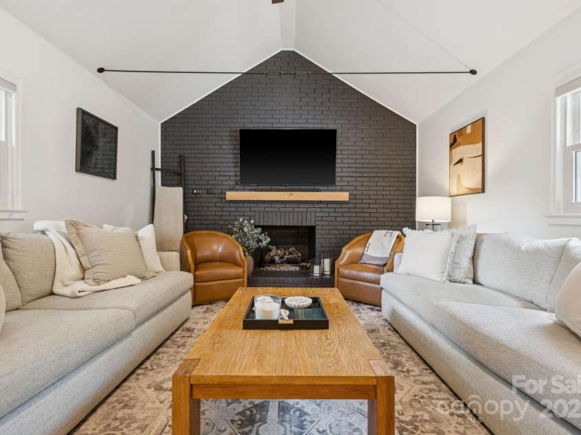 1520 Starbrook Drive, Charlotte, NC 28210.  MLS# CAR4274449, YatesRealty ID 29630. Can someone say family movie night in the den?!