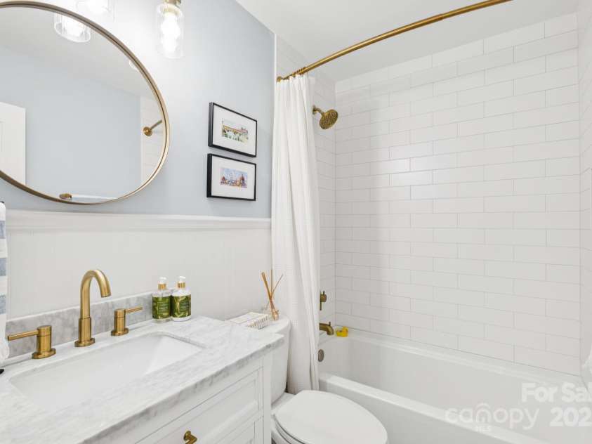 1520 Starbrook Drive, Charlotte, NC 28210.  MLS# CAR4274449, YatesRealty ID 29630. Gorgeous hallway bathroom, completely renovated in December 2023
