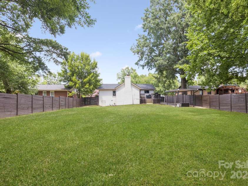 1520 Starbrook Drive, Charlotte, NC 28210.  MLS# CAR4274449, YatesRealty ID 29630. Huge, flat lot - already fenced in!