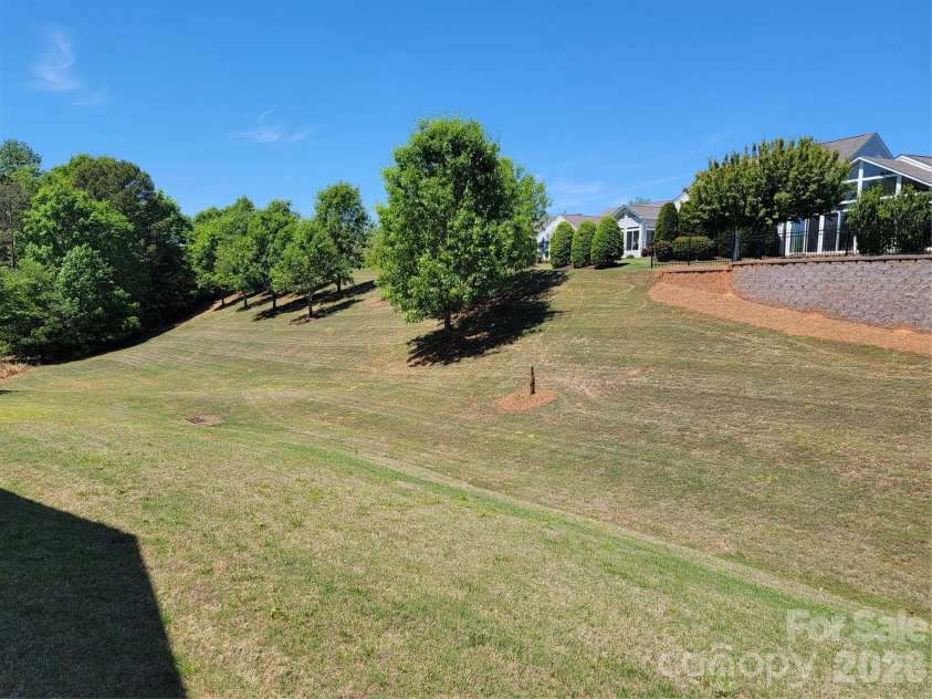 5112 Folly Lane, Fort Mill, SC 29707.  MLS# CAR4373813, YatesRealty ID 29633. View from back yard