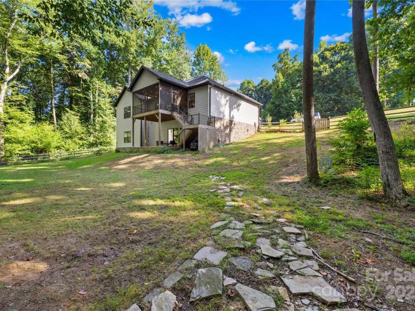 171 Shenandoah Loop, Troutman, NC 28166.  MLS# CAR4283740, YatesRealty ID 29636. Back yard