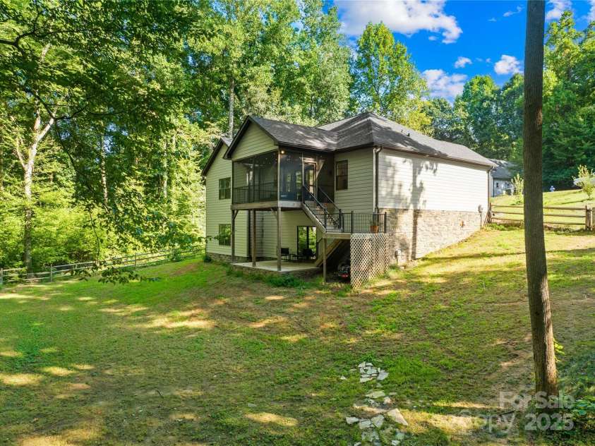 171 Shenandoah Loop, Troutman, NC 28166.  MLS# CAR4283740, YatesRealty ID 29636. Back yard