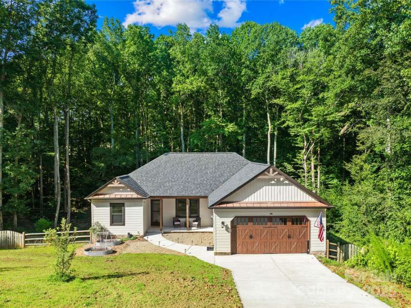 171 Shenandoah Loop, Troutman, NC 28166.  MLS# CAR4283740, YatesRealty ID 29636. Beautiful custom ranch with full walk-out basement!
