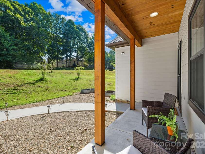 171 Shenandoah Loop, Troutman, NC 28166.  MLS# CAR4283740, YatesRealty ID 29636. Front porch