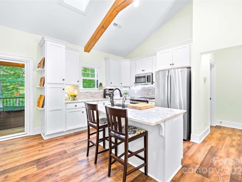 171 Shenandoah Loop, Troutman, NC 28166.  MLS# CAR4283740, YatesRealty ID 29636. Kitchen bar/isalnd