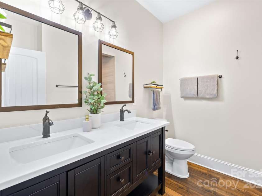 171 Shenandoah Loop, Troutman, NC 28166.  MLS# CAR4283740, YatesRealty ID 29636. Primary bathroom with two basins
