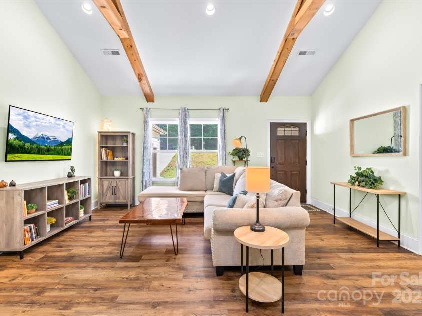 171 Shenandoah Loop, Troutman, NC 28166.  MLS# CAR4283740, YatesRealty ID 29636. Wide plank wood look flooring throughout