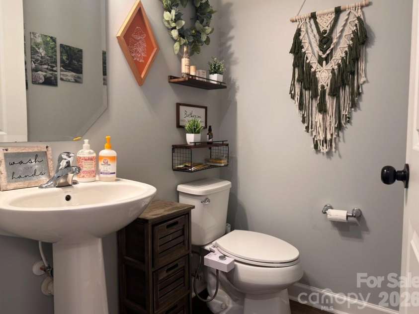 117 Fielding Street, Mount Holly, NC 28120.  MLS# CAR4390438, YatesRealty ID 29638. Half Bathroom on Main