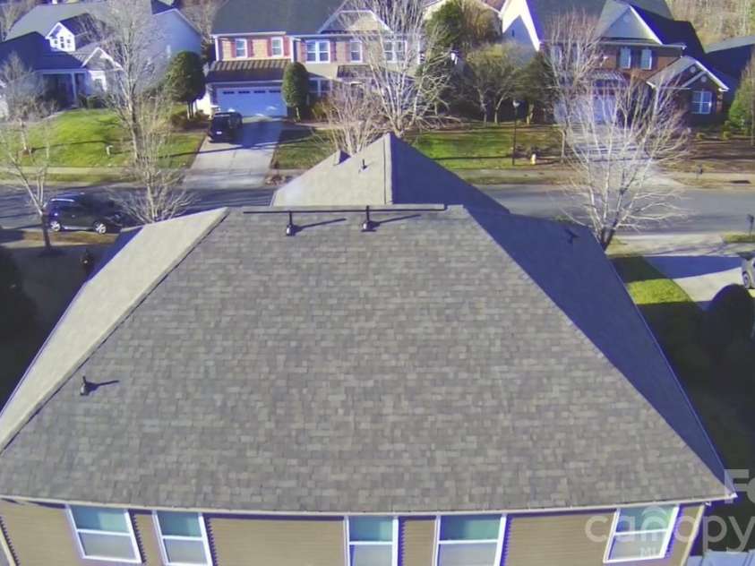 117 Fielding Street, Mount Holly, NC 28120.  MLS# CAR4390438, YatesRealty ID 29638. Roof Back